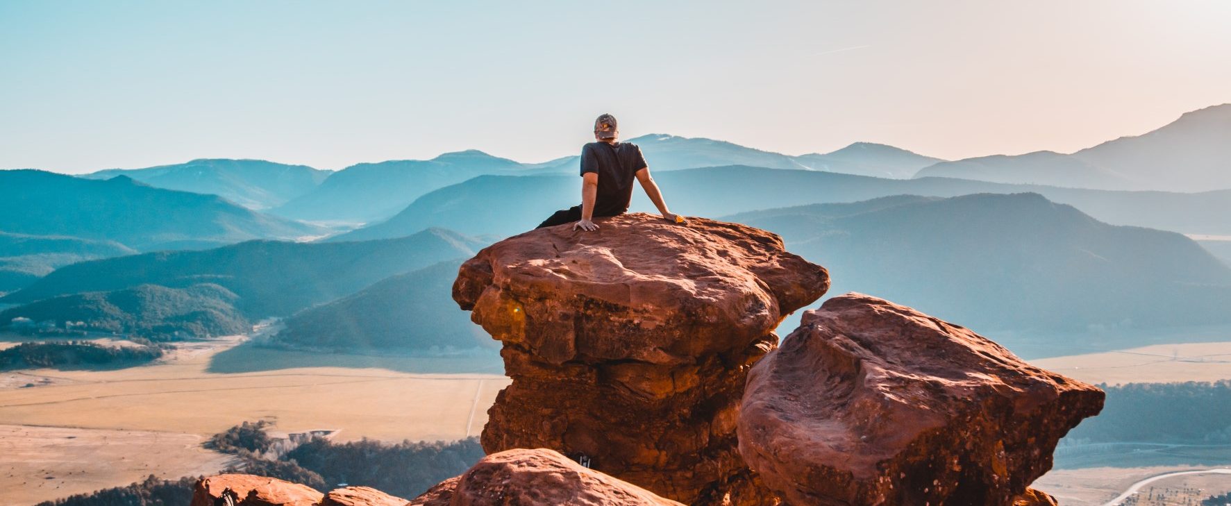 Person looking out across mountains