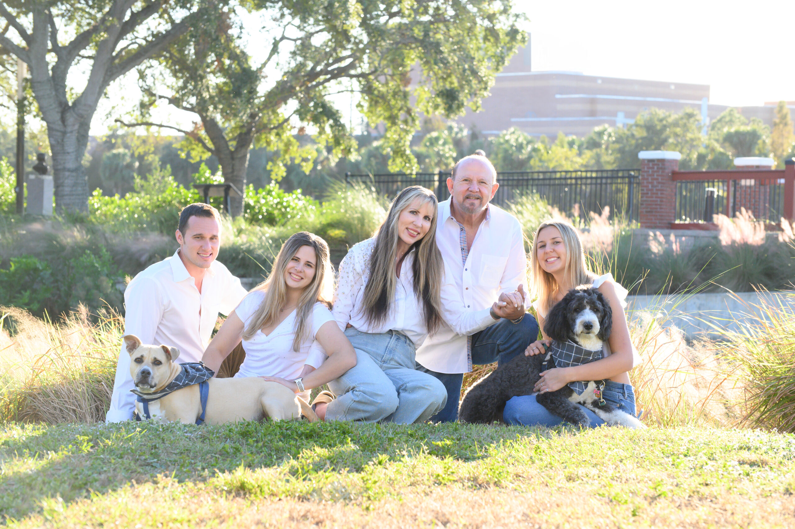 Dennis Piller with his family and their two dogs outdoors